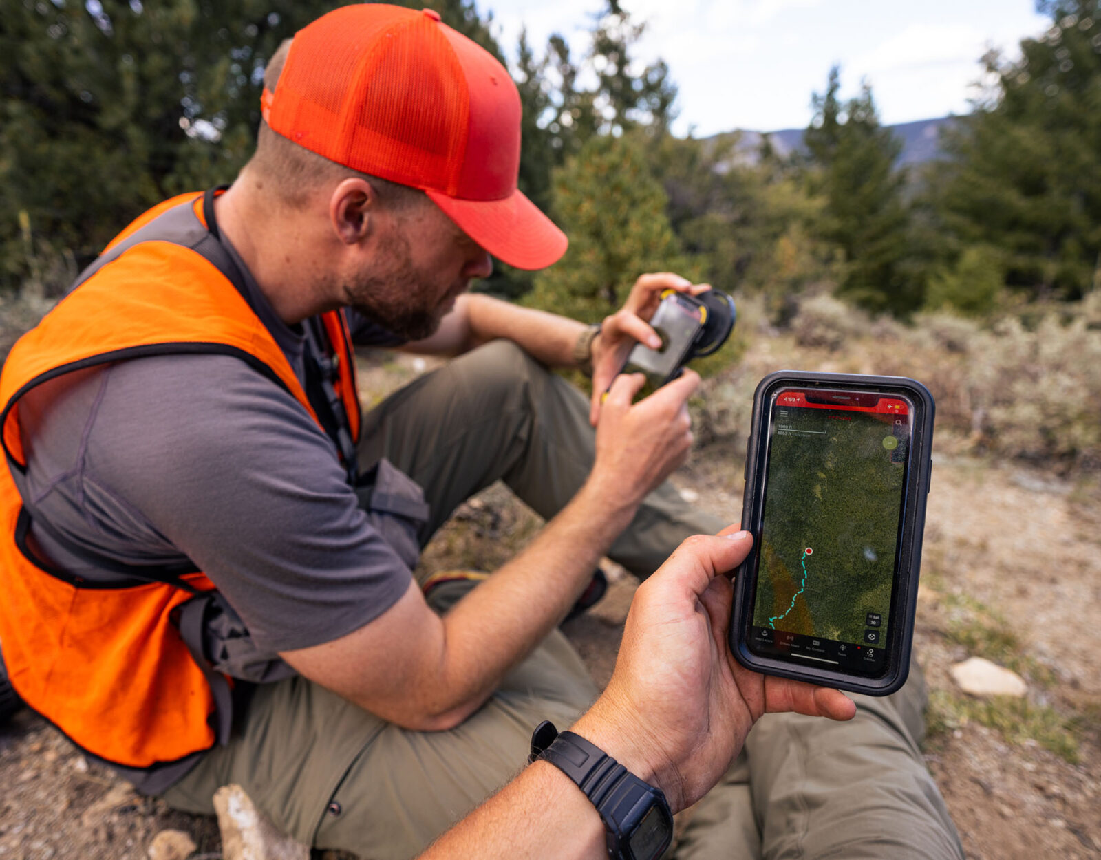 onX Hunt being used in the field by 2 hunters 