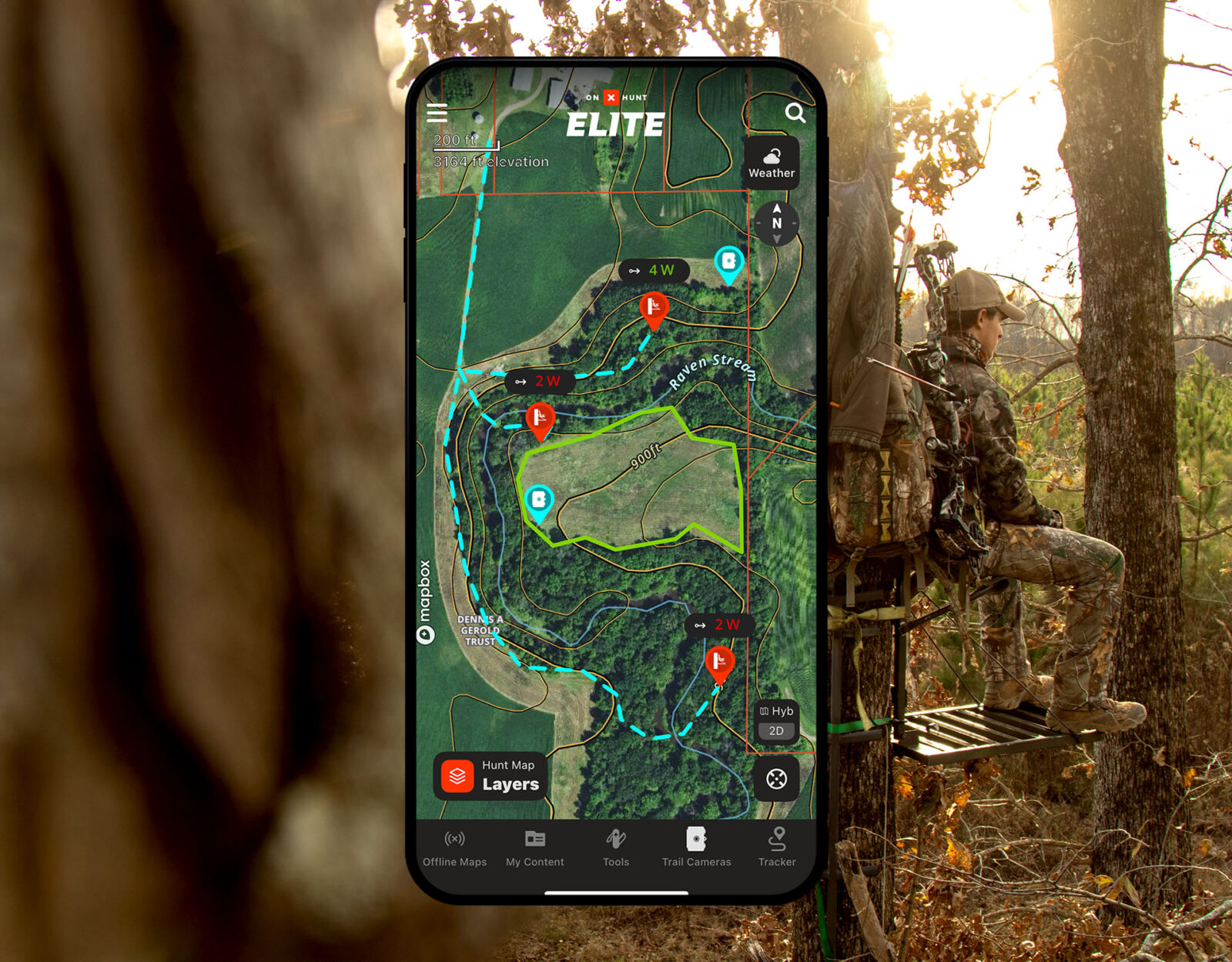 A bowhunter sits in a tree stand and a screenshot of onX Hunt overlays the image.